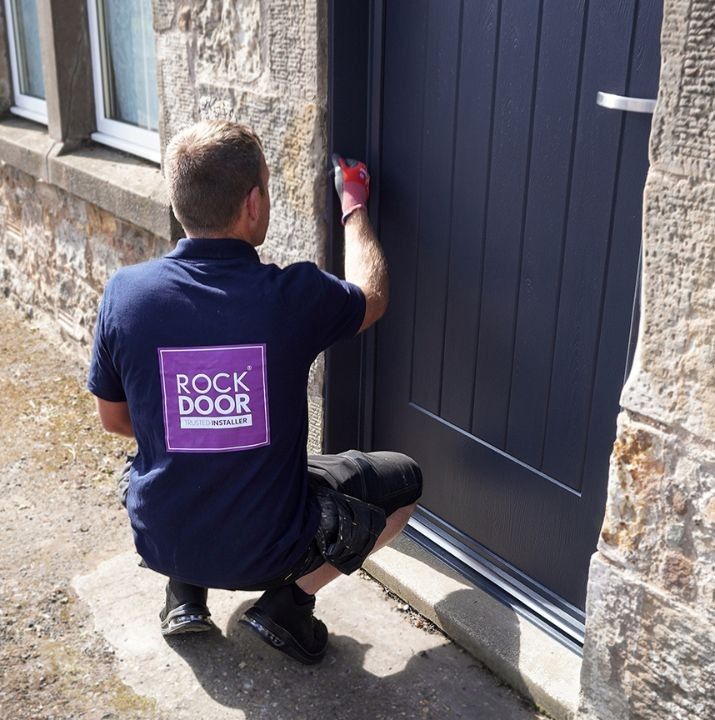 Rockdoor staff member fitting a front door