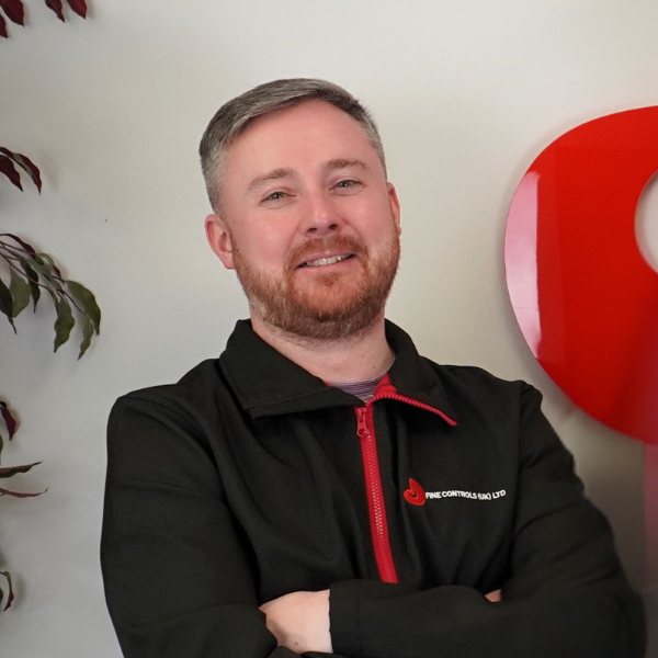 Internal Sales from Fine Controls smiling at the camera