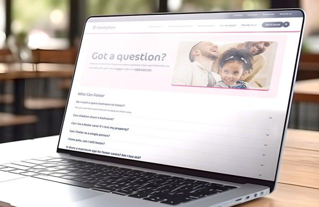FAQs page from the Family Care Group website on a laptop