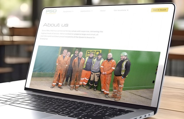 The About Us page from the PSD website on a laptop