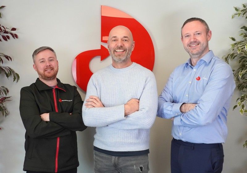 Fine Controls staff standing with Head of Digital Phil