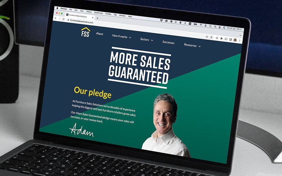 Furniture Sales Solutions website on macbook